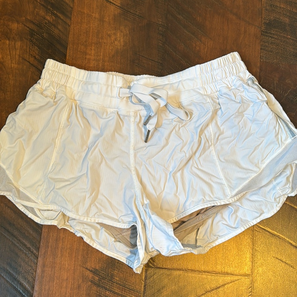 White Lululemon athletic shorts